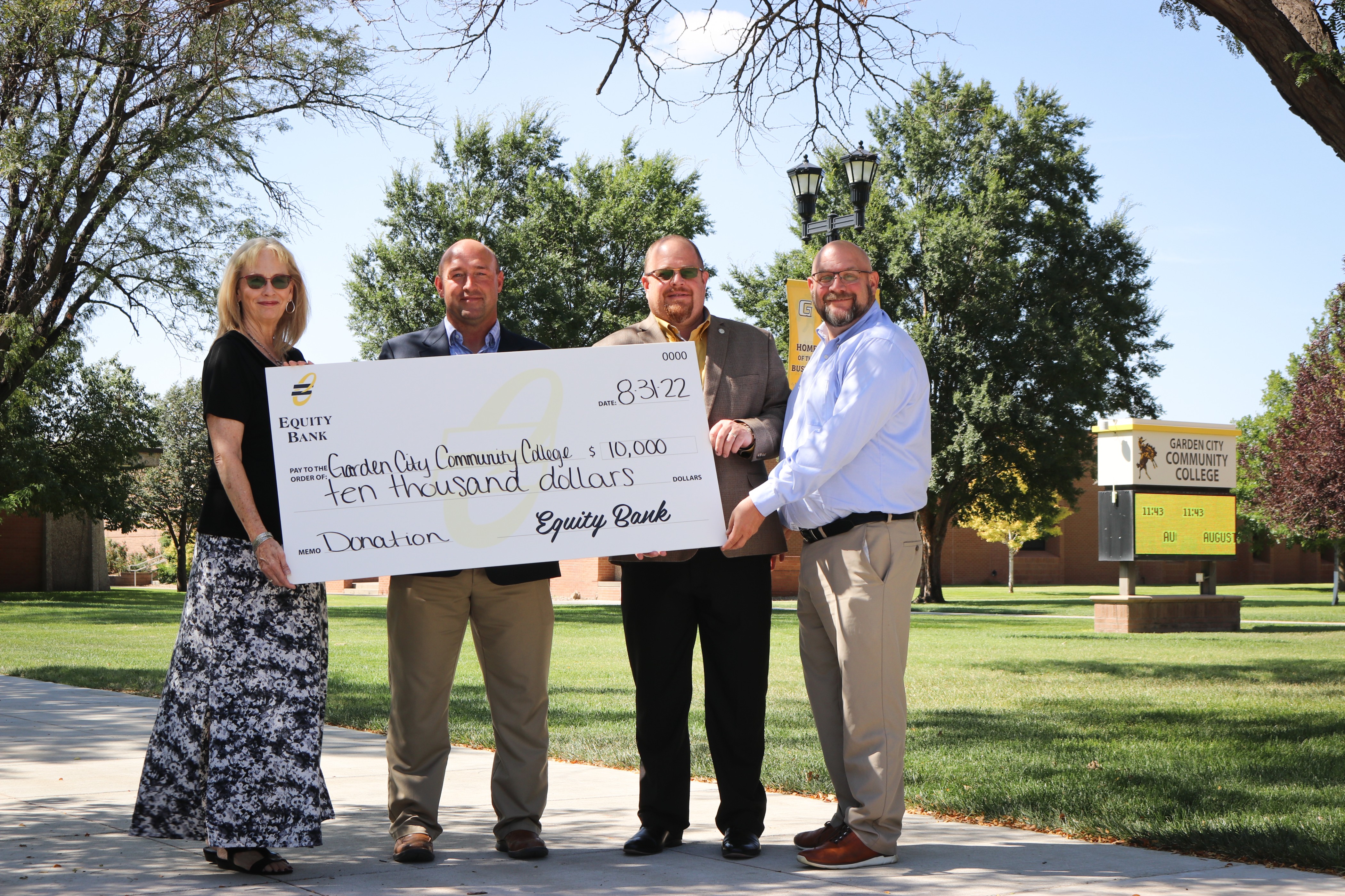 Equity Bank presents check to GCCC
