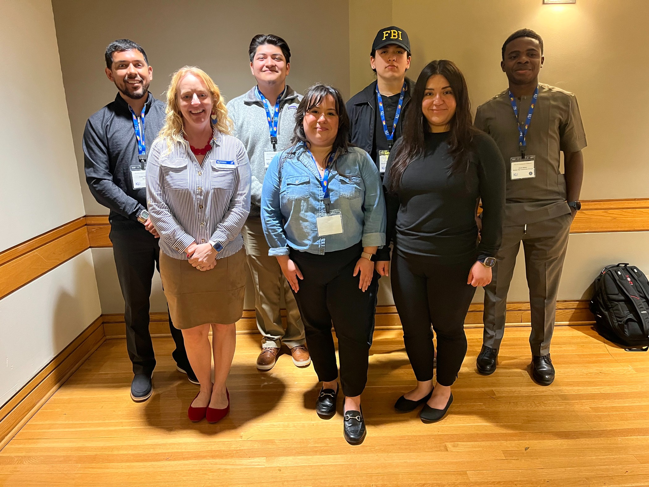 Students posed for a picture: Front Row: Dr. Ashley Urban – Education Program Manager Kansas ICCAE; Ada Chanthavong, Ruth Herrera. Back Row: Victor Herrada, Miguel Bustos, Esteffan Lucero, Aruchi Mbato.