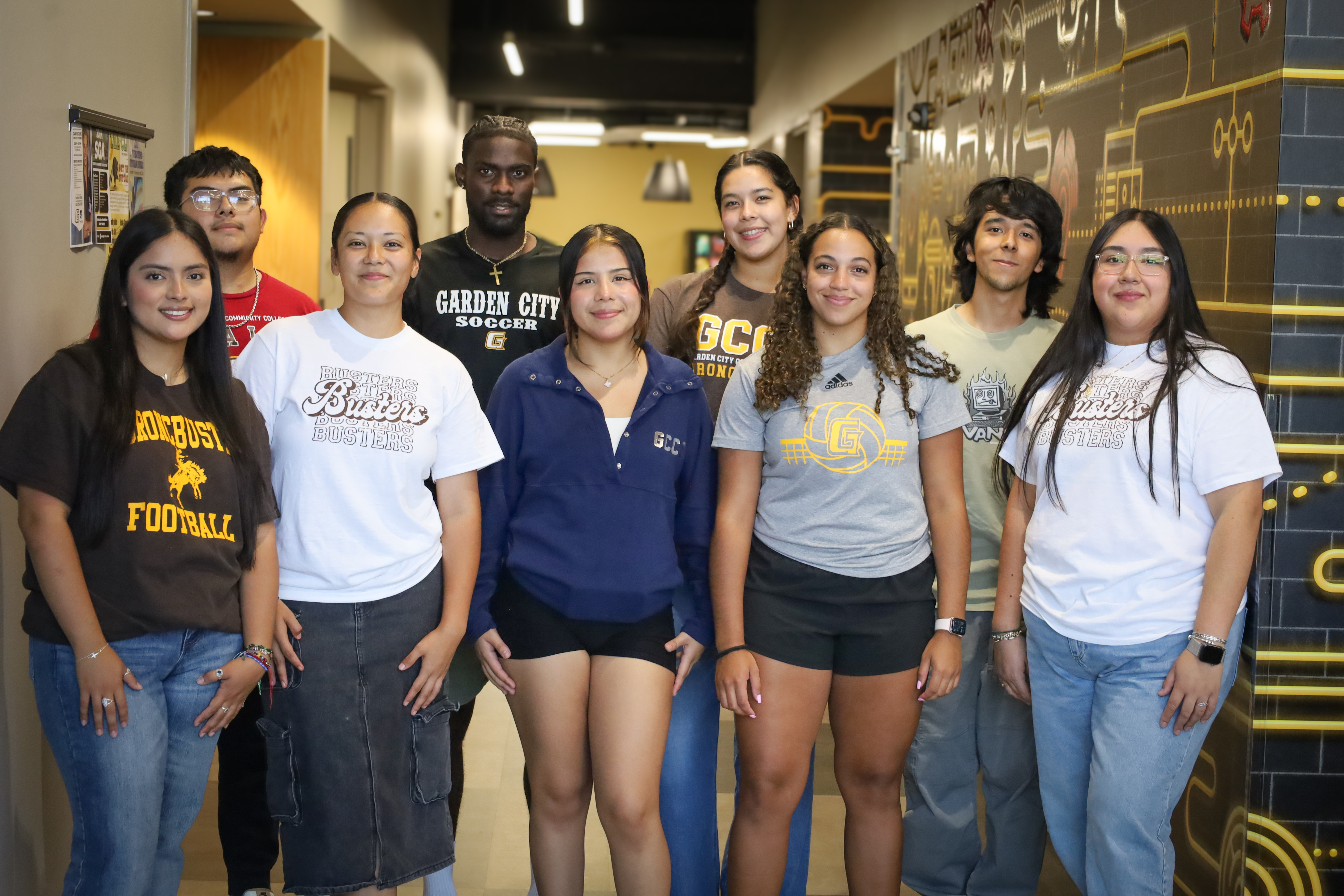 Group of students smiling and posing in stem center