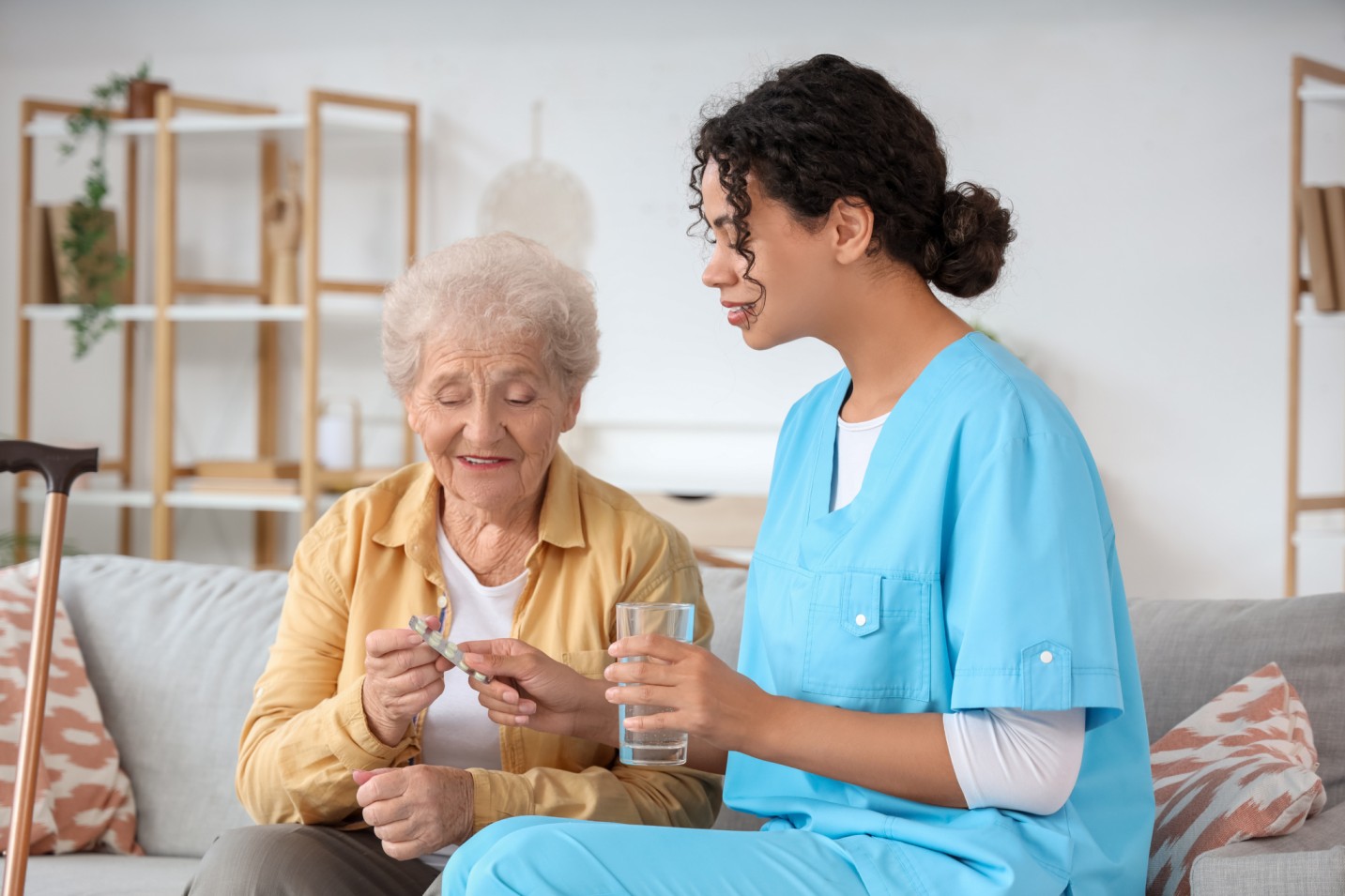 medical aide assisting patient.