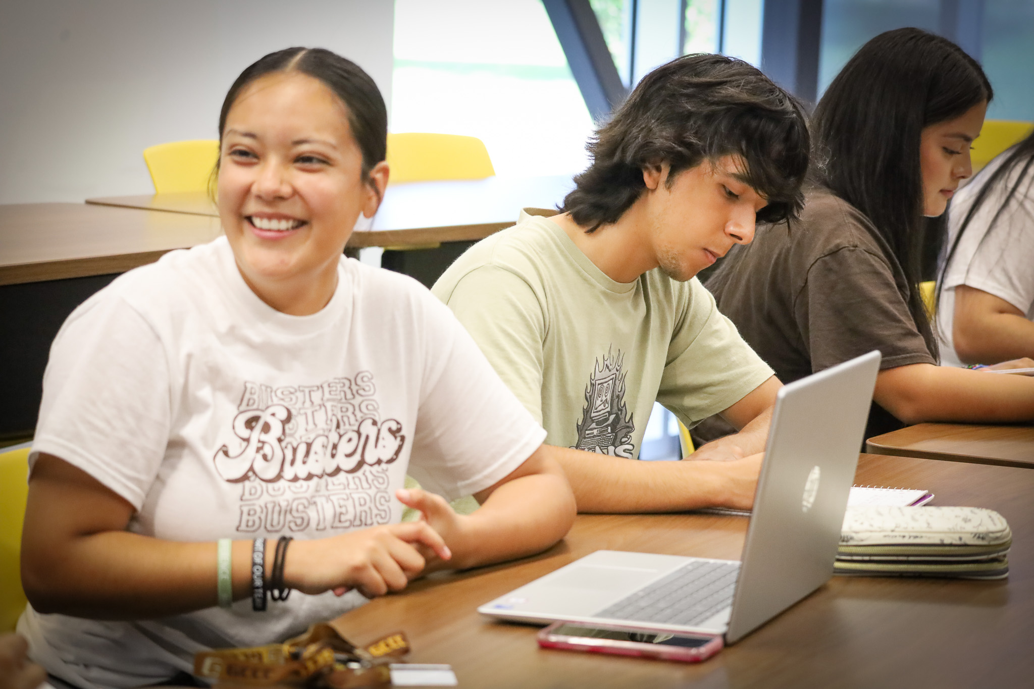 students sitting at desk in classroom