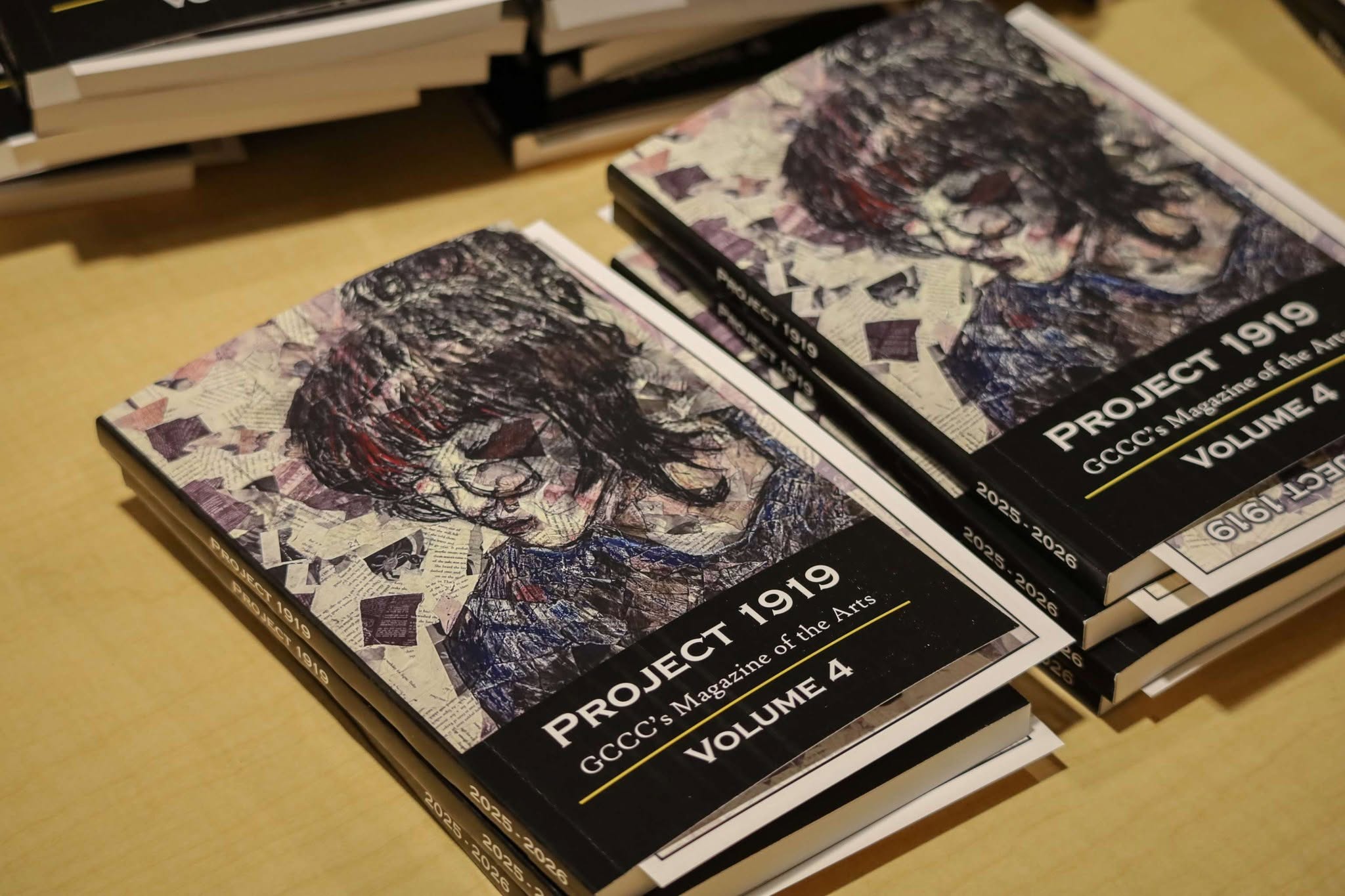 Stack of Project 1919 Volume 4 magazines displayed on a table, featuring illustrated cover art.